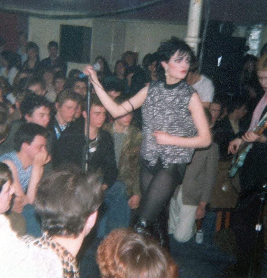 Siouxsie and the Banshees performing among the crowd at the F Club